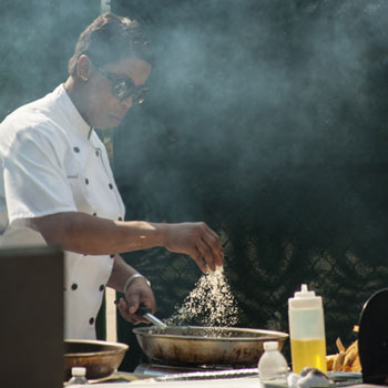 Feature Chef Sarah Koob caramelizing sugar for her pastry creations