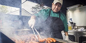 Dogs and sausages on the grill