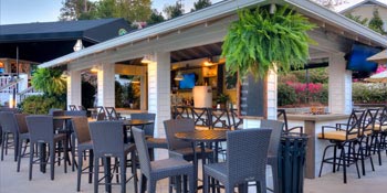 The Golf Bar and Sand Wedge Chef Action Station, next to the Club Magnolia Greens